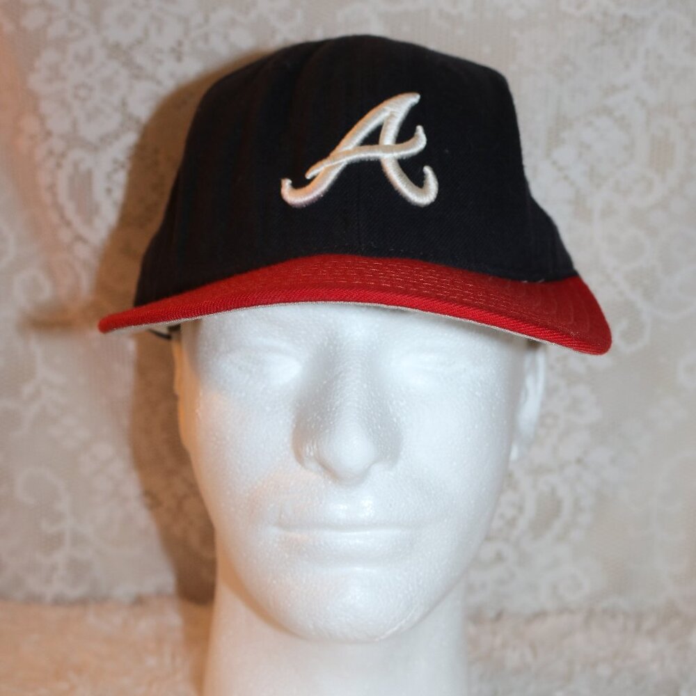 New Era vintage Atlanta Braves cap size 7 3/8 has been washed and spot treated
